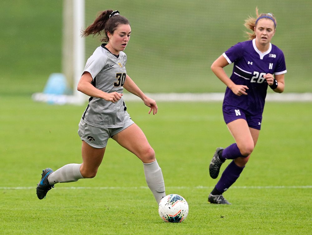 Iowa forward Devin Burns (30) moves with the ball during the first half of their match at the Iowa Soccer Complex in Iowa City on Sunday, Sep 29, 2019. (Stephen Mally/hawkeyesports.com)