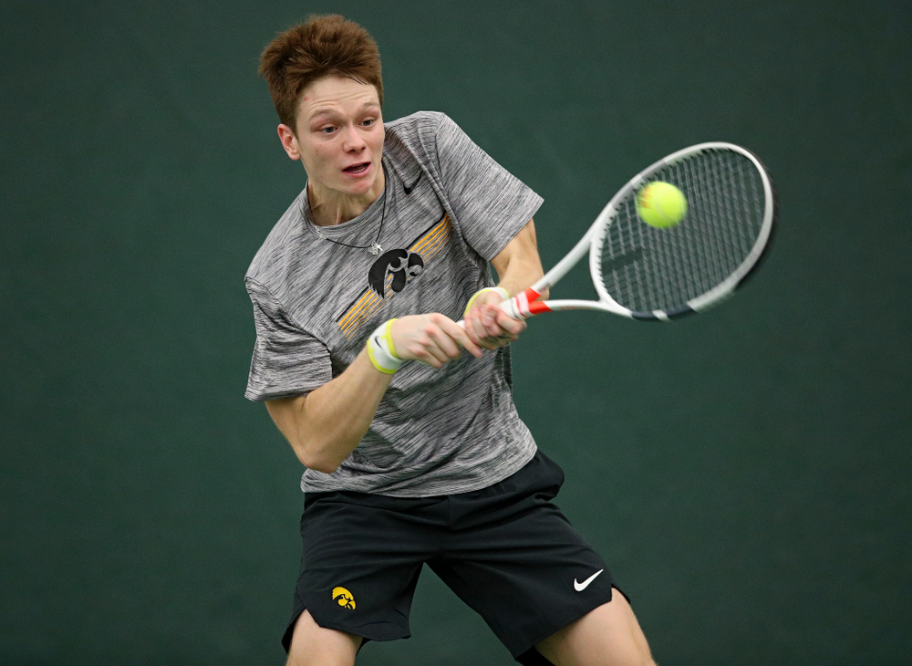 Iowa’s Jason Kerst returns a shot during their match at the Hawkeye Tennis and Recreation Complex in Iowa City on Thursday, January 16, 2020. (Stephen Mally/hawkeyesports.com)