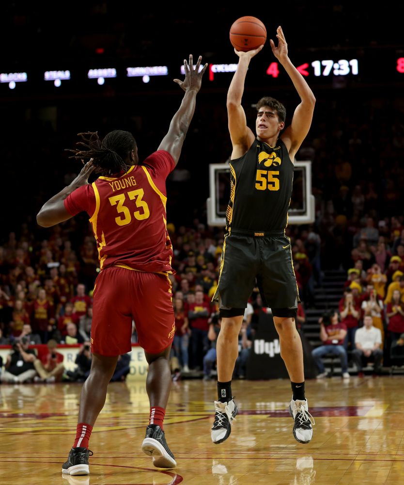 Iowa Hawkeyes forward Luka Garza (55) knocks down a three point basket against the Iowa State Cyclones Thursday, December 12, 2019 at Hilton Coliseum in Ames, Iowa(Brian Ray/hawkeyesports.com)