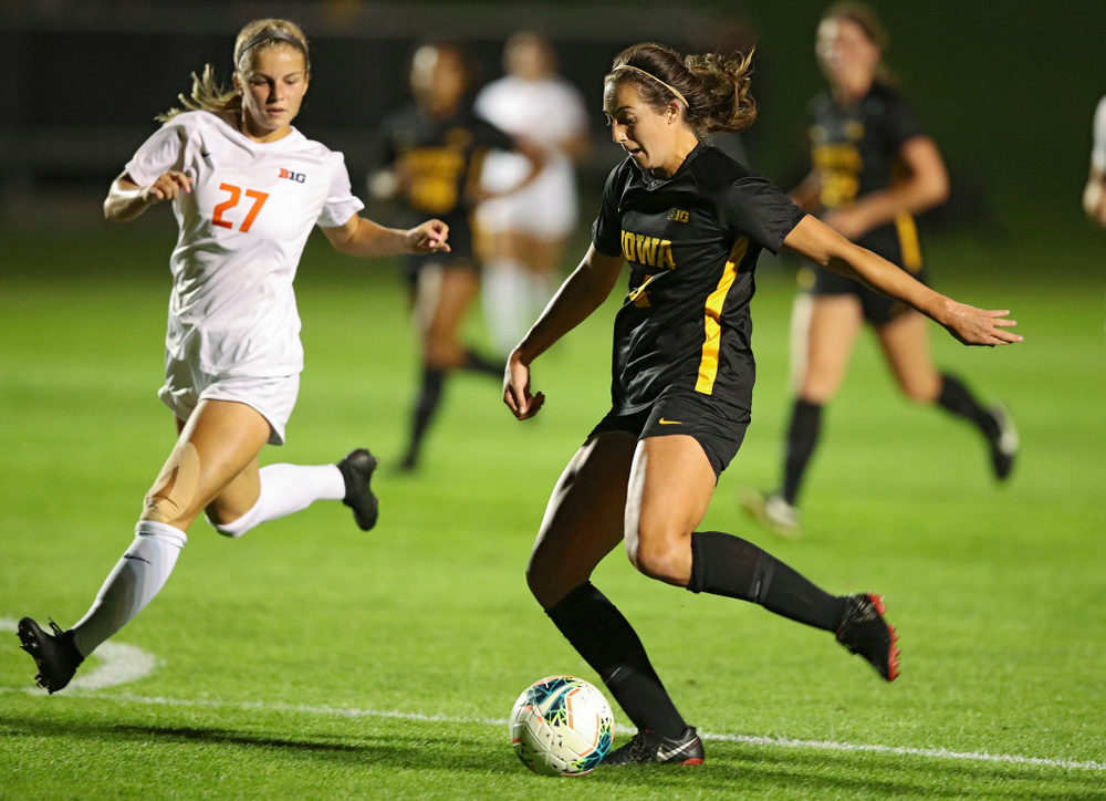 Iowa forward Kaleigh Haus (4) lines up a shot during the first half of their match against Illinois at the Iowa Soccer Complex in Iowa City on Thursday, Sep 26, 2019. (Stephen Mally/hawkeyesports.com)