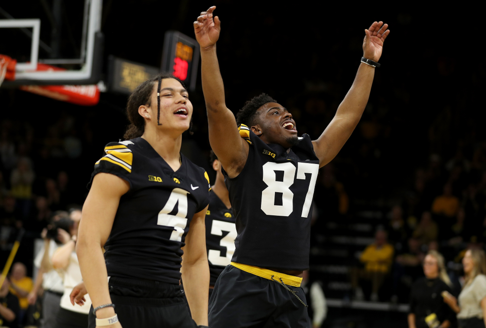 Members of the Hawkeye Football team performs with the Iowa Dance Team at halftime of the Iowa Hawkeyes game against the Ohio State Buckeyes Thursday, February 20, 2020 at Carver-Hawkeye Arena. (Brian Ray/hawkeyesports.com)