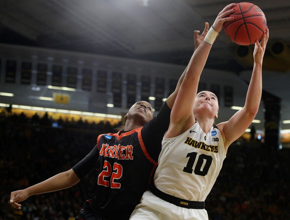 Iowa Hawkeyes forward Megan Gustafson (10) pulls in a rebound during the first round of the 2019 NCAA Women's Basketball Tournament at Carver Hawkeye Arena in Iowa City on Friday, Mar. 22, 2019. (Stephen Mally for hawkeyesports.com)