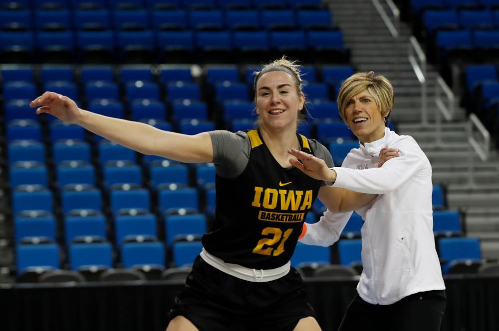 Iowa Hawkeyes forward Hannah Stewart (21) works against associate head coach Jan Jensen during practice Friday, March 16, 2018 at Pauley Pavilion on the campus of UCLA. (Brian Ray/hawkeyesports.com)