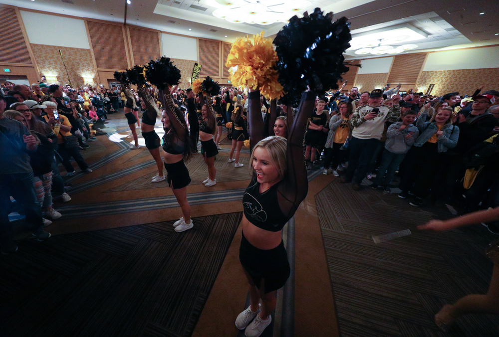 Members of the Iowa Spirit Squad perform during the Holiday Bowl Hawkeye Huddle Thursday, December 26, 2019 at the Hilton in downtown San Diego. (Brian Ray/hawkeyesports.com)