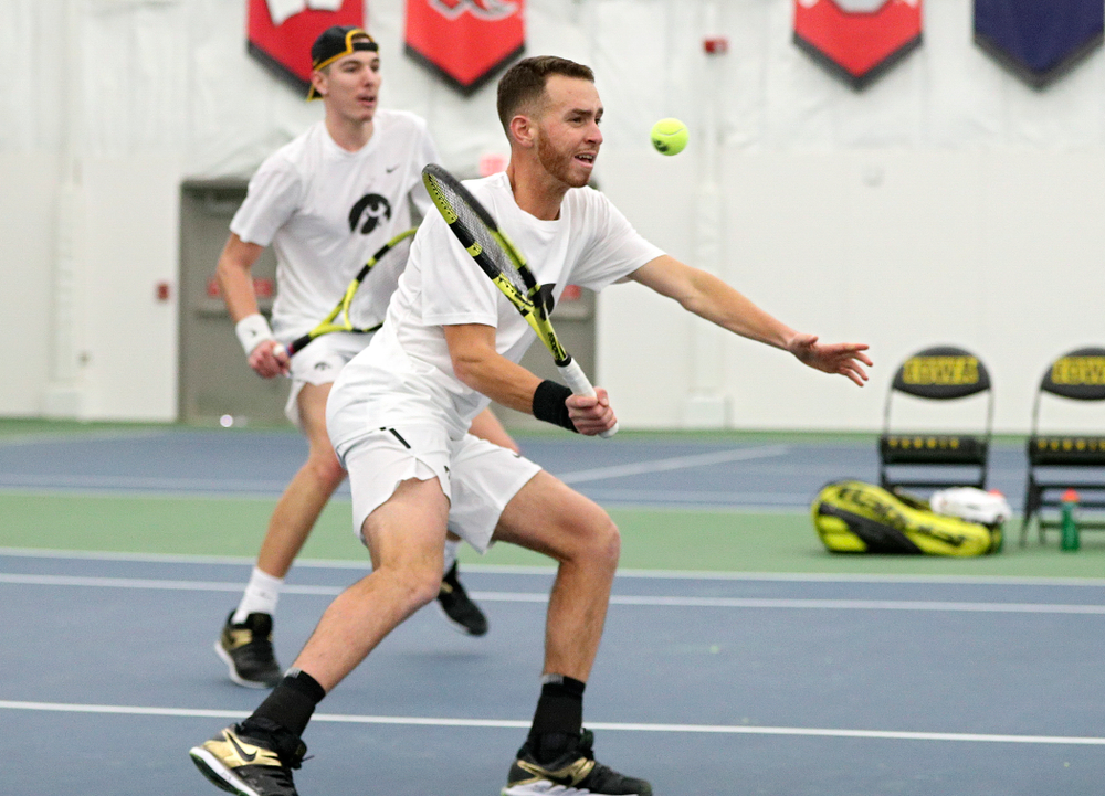 Iowa’s Kareem Allaf returns a shot during his doubles match at the Hawkeye Tennis and Recreation Complex in Iowa City on Sunday, February 16, 2020. (Stephen Mally/hawkeyesports.com)