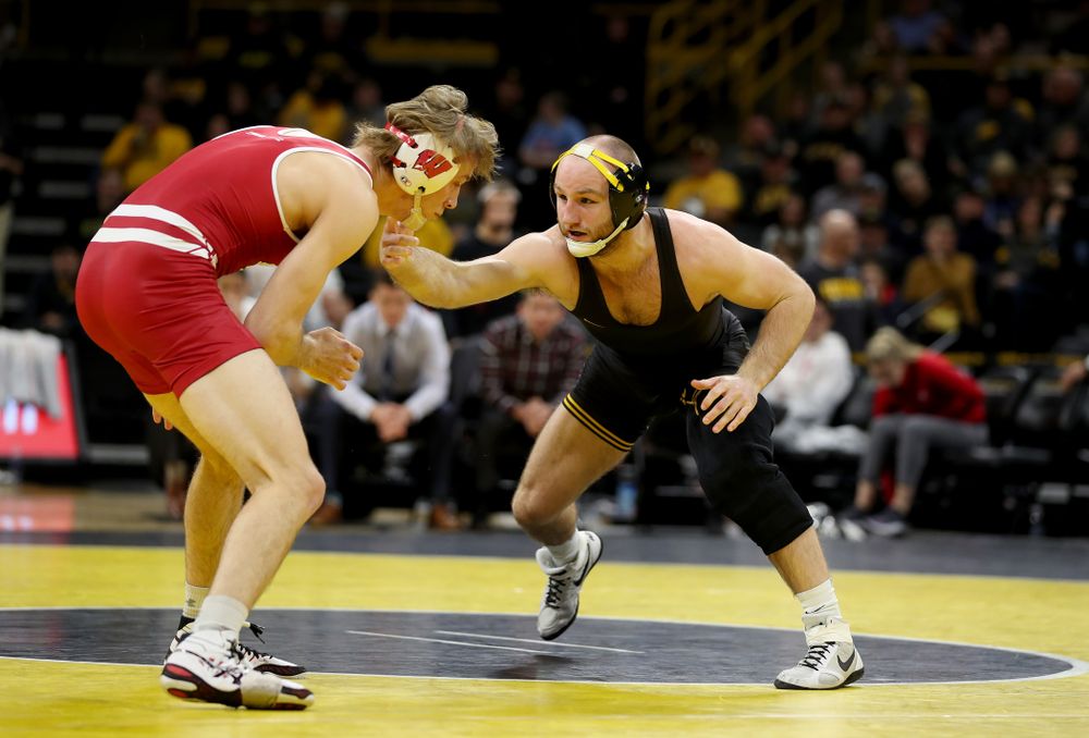 IowaÕs Alex Marinelli wrestles WisconsinÕs Evan Wick at 165 pounds Sunday, December 1, 2019 at Carver-Hawkeye Arena. Marinelli won the match 4-2. (Brian Ray/hawkeyesports.com)