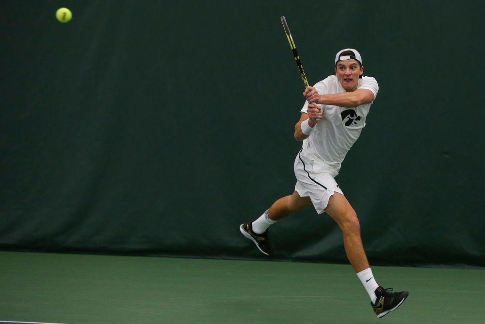Iowa’s Joe Tyler hits a backhand during the Iowa men’s tennis match vs Western Michigan on Saturday, January 18, 2020 at the Hawkeye Tennis and Recreation Complex. (Lily Smith/hawkeyesports.com)