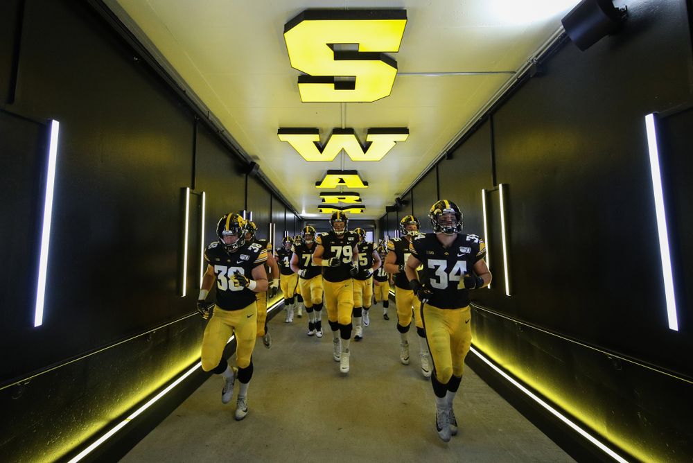 The Iowa Hawkeyes return to the locker room following their game against the Miami RedHawks Saturday, August 31, 2019 at Kinnick Stadium in Iowa City. (Brian Ray/hawkeyesports.com)