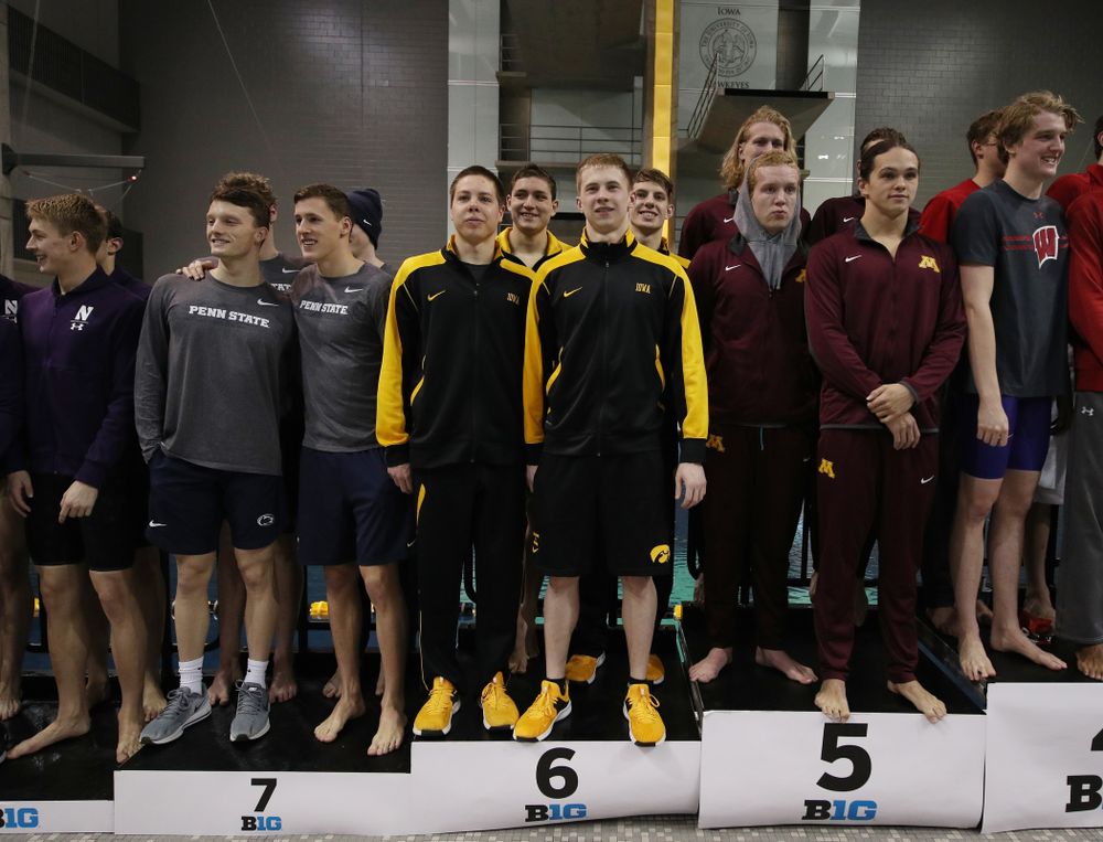 Iowa's Aleksey Tarasenko, Mateusz Arndt, Jackson Allmon, and Michael Tenney place sixth in the 800 freestyle relay at the 2019 Big Ten Swimming and Diving meet Wednesday, February 27, 2019 at the Campus Wellness and Recreation Center. (Brian Ray/hawkeyesports.com)