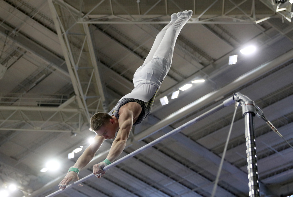 Iowa’s Carter Tope competes on the high bar against UIC and Minnesota Saturday, February 1, 2020 at Carver-Hawkeye Arena. (Brian Ray/hawkeyesports.com)