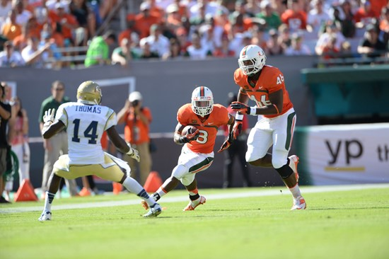 University of Miami Hurricanes running back Duke Johnson #8 plays in a game against the Georgia Tech Yellow Jackets at Sun Life Stadium on October 5,...