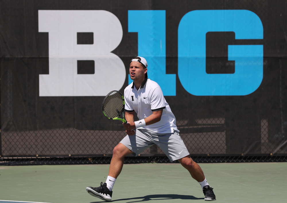 IowaÕs Oliver Okonkwo and Will Davies play a doubles match against the Michigan Wolverines Sunday, April 21, 2019 at the Hawkeye Tennis and Recreation Complex. (Brian Ray/hawkeyesports.com)