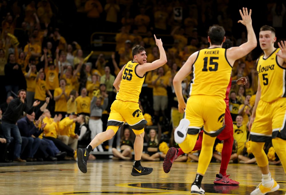 Iowa Hawkeyes forward Luka Garza (55) celebrates a three point basket against the Rutgers Scarlet Knights Wednesday, January 22, 2020 at Carver-Hawkeye Arena. (Brian Ray/hawkeyesports.com)