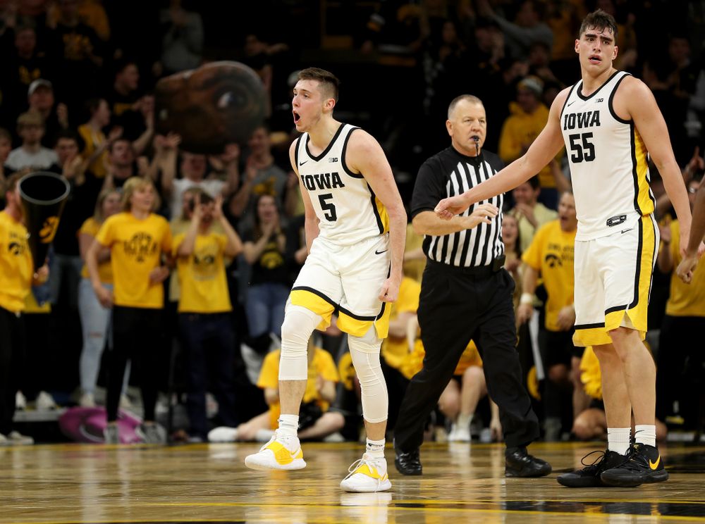 Iowa Hawkeyes guard CJ Fredrick (5) celebrates a three point basket against the Michigan Wolverines Friday, January 17, 2020 at Carver-Hawkeye Arena. (Brian Ray/hawkeyesports.com)