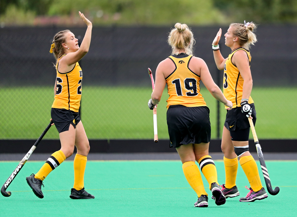 Iowa’s Leah Zellner (right) celebrates her goal with Maddy Murphy (left) and Ryley Miller (19) during the first quarter of their game against UC Davis at Grant Field in Iowa City on Sunday, Oct 6, 2019. (Stephen Mally/hawkeyesports.com)