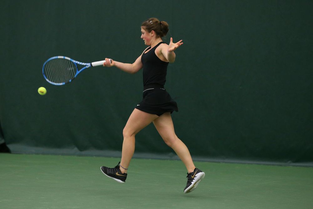 Iowa’s Erika Dodridge returns a hit during the Iowa women’s tennis meet vs UNI on Saturday, February 29, 2020 at the Hawkeye Tennis and Recreation Complex. (Lily Smith/hawkeyesports.com)