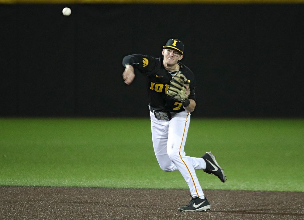 Iowa infielder Brendan Sher (2) throws to first for an out during the eighth inning of their game at Duane Banks Field in Iowa City on Tuesday, March 3, 2020. (Stephen Mally/hawkeyesports.com)