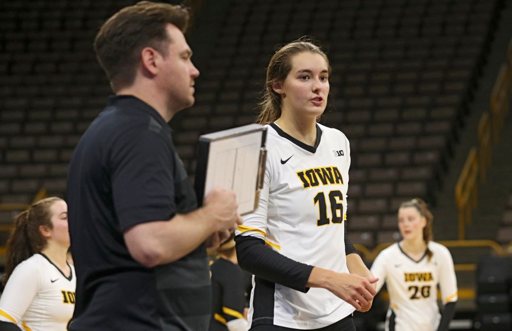 Iowa’s Grace Tubbs (16) talks with assistant coach Bobby Hughes during the second set of the Black and Gold scrimmage at Carver-Hawkeye Arena in Iowa City on Saturday, Aug 24, 2019. (Stephen Mally/hawkeyesports.com)