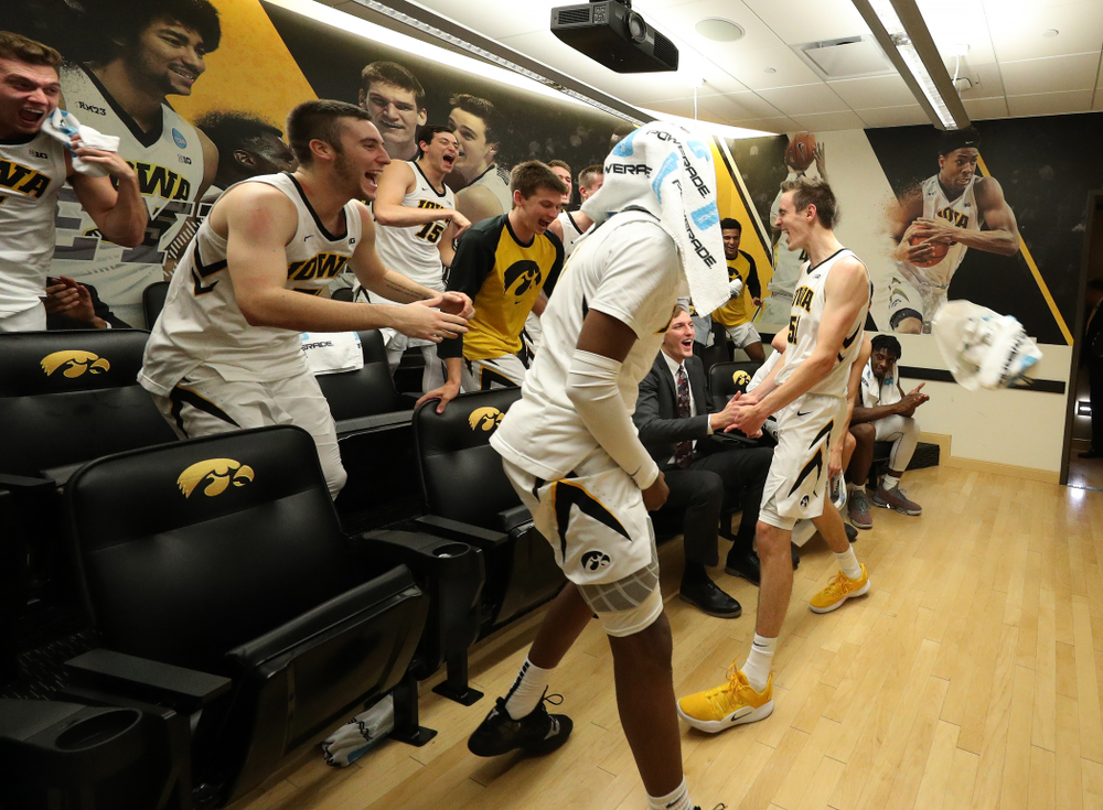 Iowa Hawkeyes forward Nicholas Baer (51) celebrates their victory against the Pitt Panthers Tuesday, November 27, 2018 at Carver-Hawkeye Arena. (Brian Ray/hawkeyesports.com)
