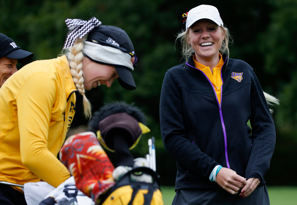 Northern Iowa assistant coach Jessie Sindlinger laughs with former teammate Shawn Rennegarbe at the eighth tee during the Diane Thomason Invitational at Finkbine Golf Course on September 29, 2018. (Tork Mason/hawkeyesports.com)
