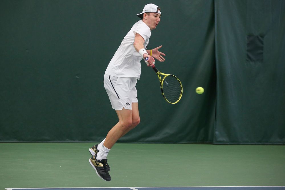 Iowa’s Nikita Snezhko returns a hit during the Iowa men’s tennis meet vs Nebraska on Sunday, March 1, 2020 at the Hawkeye Tennis and Recreation Complex. (Lily Smith/hawkeyesports.com)