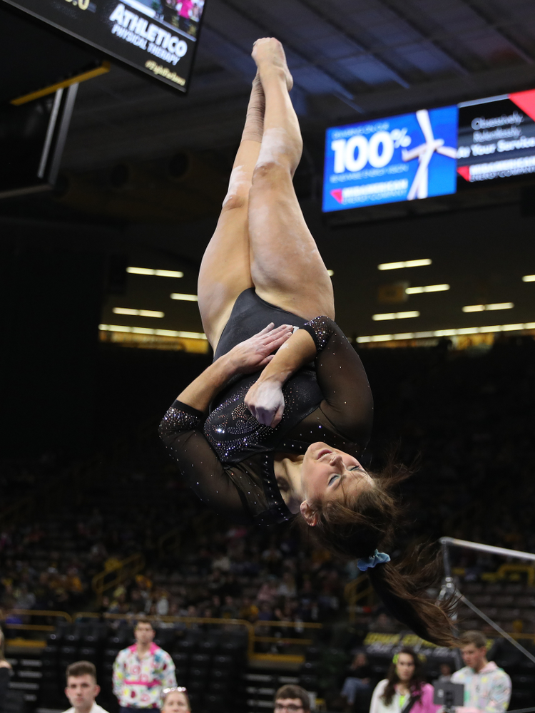Iowa’s Erin Castle competes on the beam against Michigan Friday, February 14, 2020 at Carver-Hawkeye Arena. (Brian Ray/hawkeyesports.com)