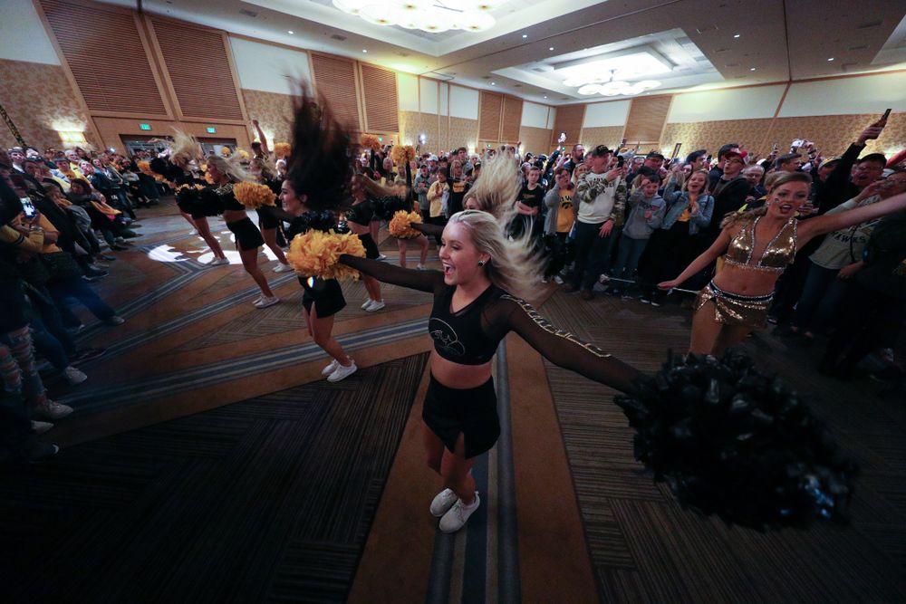 The Hawkeye Marching Band and the Iowa Spirit Squads perform during the Holiday Bowl Hawkeye Huddle Thursday, December 26, 2019 at the Hilton in downtown San Diego. (Brian Ray/hawkeyesports.com)