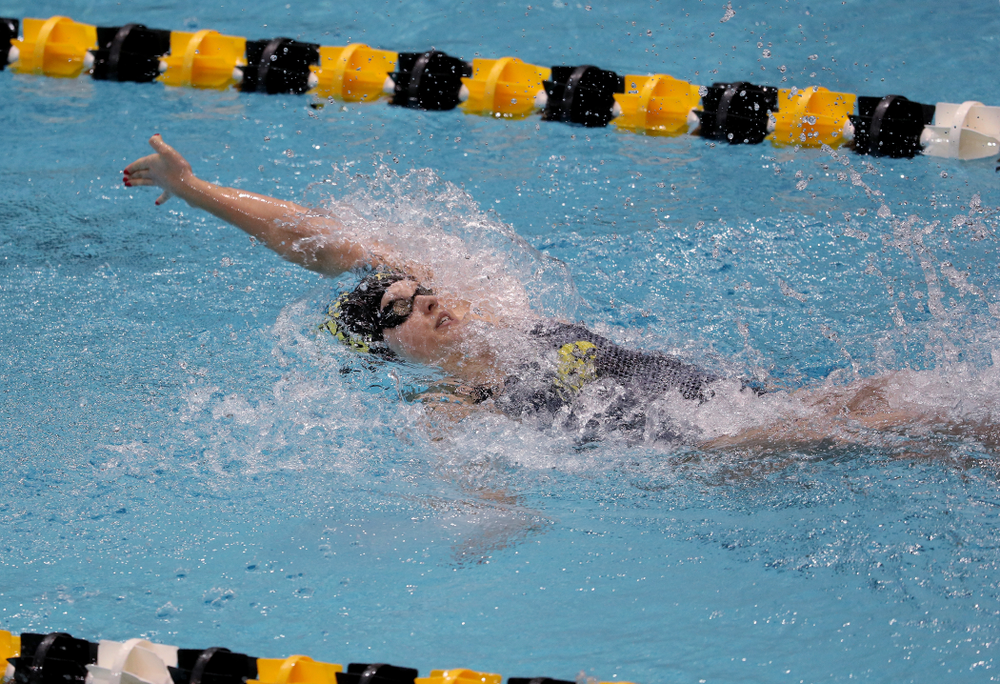 IowaÕs Julia Koluch competes in the 100 yard backstroke against Notre Dame and Illinois Saturday, January 11, 2020 at the Campus Recreation and Wellness Center. (Brian Ray/hawkeyesports.com)