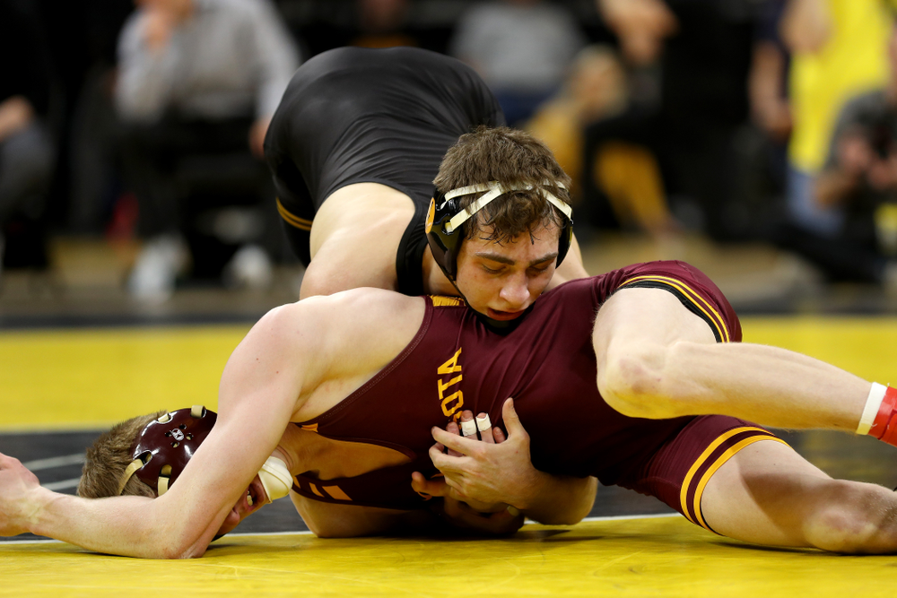 Iowa’s Austin DeSanto wrestles Minnesota’s Boo Dryden at 133 pounds Saturday, February 15, 2020 at Carver-Hawkeye Arena. DeSanto won the match 24-8. (Brian Ray/hawkeyesports.com)