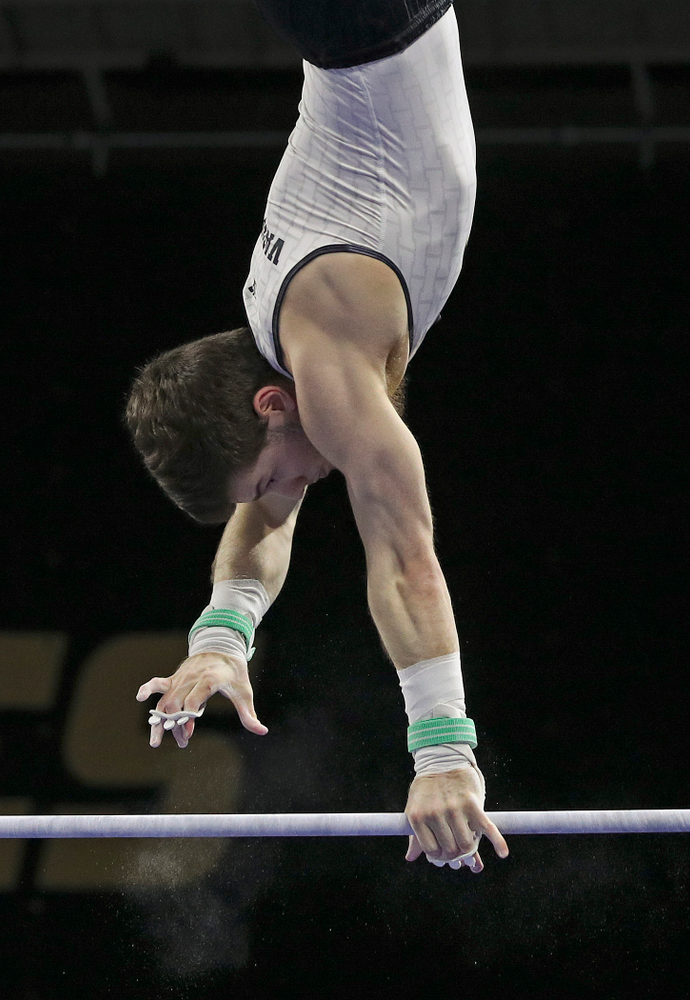 Iowa's Rogelio Vazquez competes in the horizontal bar during the second day of the Big Ten Men's Gymnastics Championships at Carver-Hawkeye Arena in Iowa City on Saturday, Apr. 6, 2019. (Stephen Mally/hawkeyesports.com)