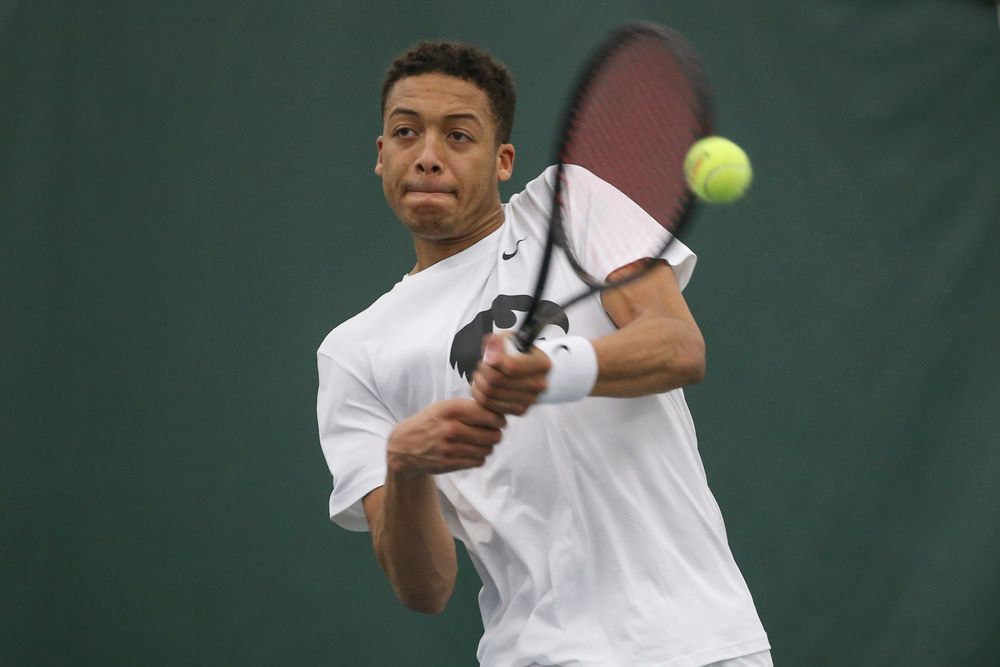Iowa’s Oliver Okonkwo returns a hit during the Iowa men’s tennis meet vs Nebraska on Sunday, March 1, 2020 at the Hawkeye Tennis and Recreation Complex. (Lily Smith/hawkeyesports.com)