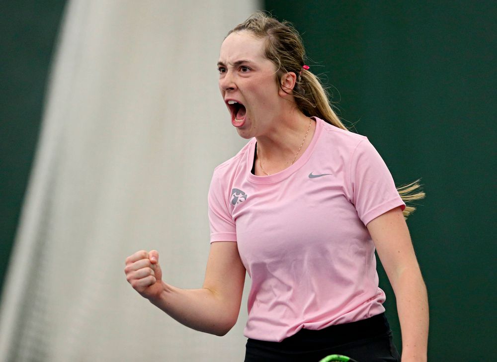Iowa's Samantha Mannix celebrates a score during their doubles match against Purdue at the Hawkeye Tennis and Recreation Complex in Iowa City on Friday, Mar. 29, 2019. (Stephen Mally/hawkeyesports.com)