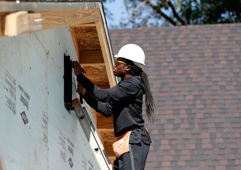 Iowa Hawkeyes guard Tomi Taiwo (1) works on the Habitat for Humanity Women's Build Wednesday, September 26, 2018 in Iowa City. (Brian Ray/hawkeyesports.com)