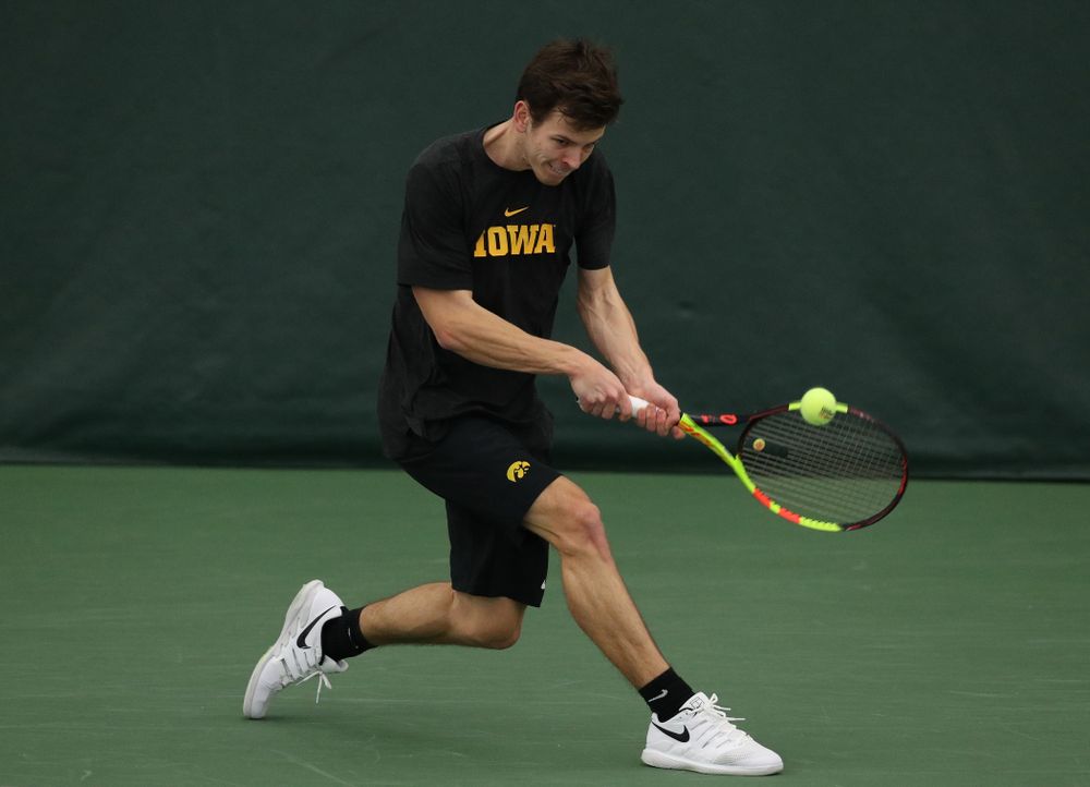 Iowa's Piotr Smietana against UMKC Friday, February 15, 2019 at the Hawkeye Tennis and Recreation Complex. (Brian Ray/hawkeyesports.com)