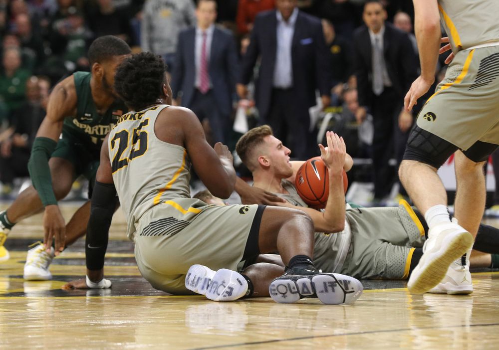 Iowa Hawkeyes guard Jordan Bohannon (3) and forward Tyler Cook (25) against the Michigan State Spartans Thursday, January 24, 2019 at Carver-Hawkeye Arena. (Brian Ray/hawkeyesports.com)