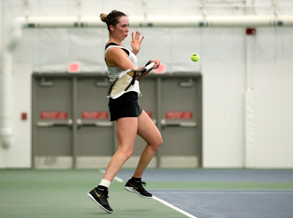 Iowa’s Samantha Mannix returns a shot during her singles match at the Hawkeye Tennis and Recreation Complex in Iowa City on Sunday, February 23, 2020. (Stephen Mally/hawkeyesports.com)