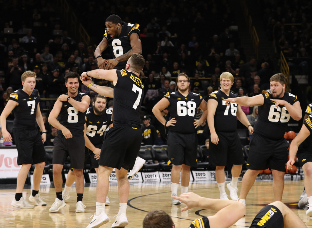 The Iowa Dance Team performs with the Iowa Football Team at halftime of the Iowa Hawkeyes game against the Indiana Hoosiers Friday, February 22, 2019 at Carver-Hawkeye Arena. (Brian Ray/hawkeyesports.com)