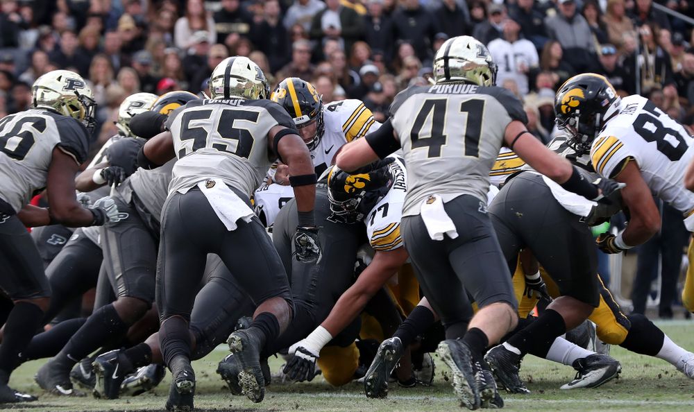Iowa Hawkeyes quarterback Nate Stanley (4) scores a touchdown against the Purdue Boilermakers Saturday, November 3, 2018 Ross Ade Stadium in West Lafayette, Ind. (Brian Ray/hawkeyesports.com)