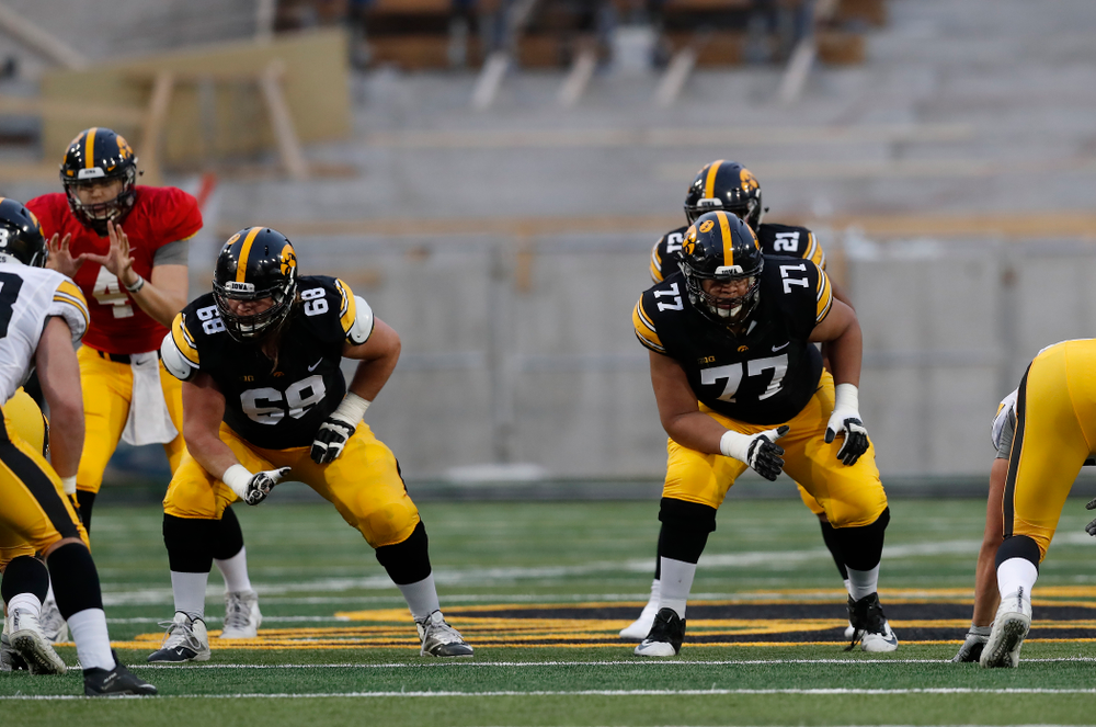 Iowa Hawkeyes offensive lineman Landan Paulsen (68) and offensive lineman Alaric Jackson (77) during the final spring practice Friday, April 20, 2018 at Kinnick Stadium. (Brian Ray/hawkeyesports.com)