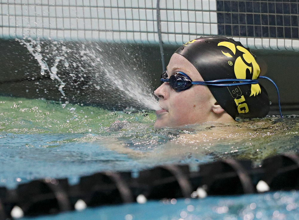 Iowa’s Ariel Wooden blows water from her mouth after swimming the 100-yard individual medley event during their meet against Michigan State at the Campus Recreation and Wellness Center in Iowa City on Thursday, Oct 3, 2019. (Stephen Mally/hawkeyesports.com)