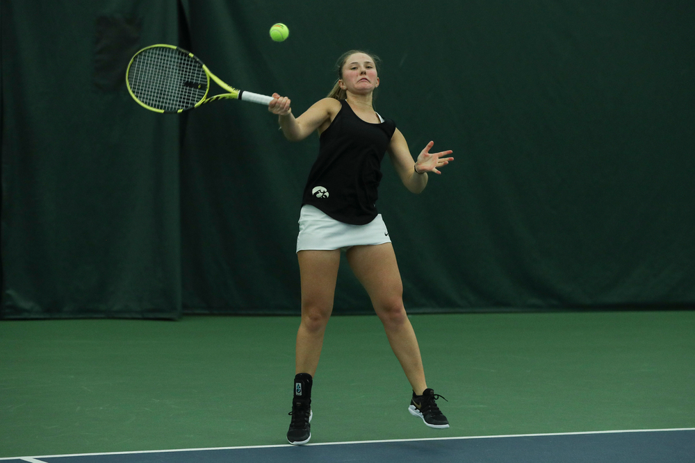 Iowa’s Danielle Burich returns a hit during the Iowa women’s tennis meet vs DePaul on Friday, February 21, 2020 at the Hawkeye Tennis and Recreation Complex. (Lily Smith/hawkeyesports.com)