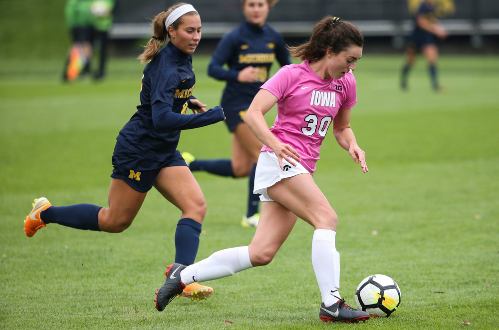 Iowa Hawkeyes forward Devin Burns (30) dribbles the ball during a game against Michigan at the Iowa Soccer Complex on October 14, 2018. (Tork Mason/hawkeyesports.com)