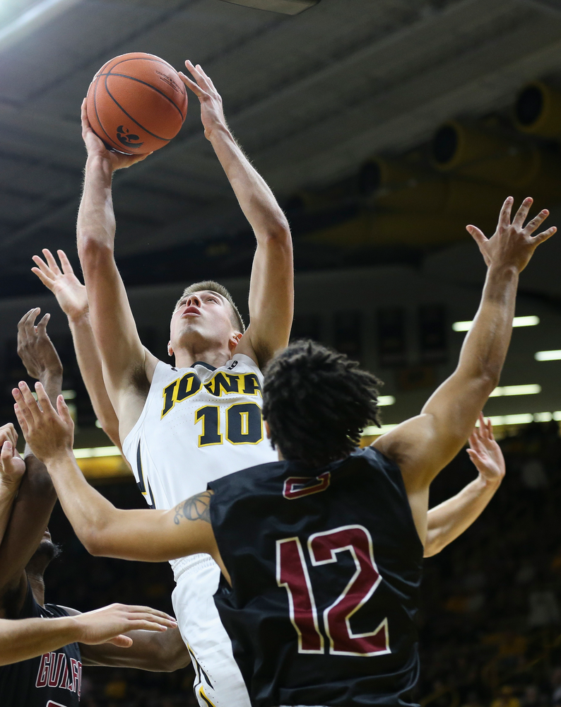 Iowa Hawkeyes guard Joe Wieskamp (10) goes up for a shot near the rim during a game against Guilford College at Carver-Hawkeye Arena on November 4, 2018. (Tork Mason/hawkeyesports.com)