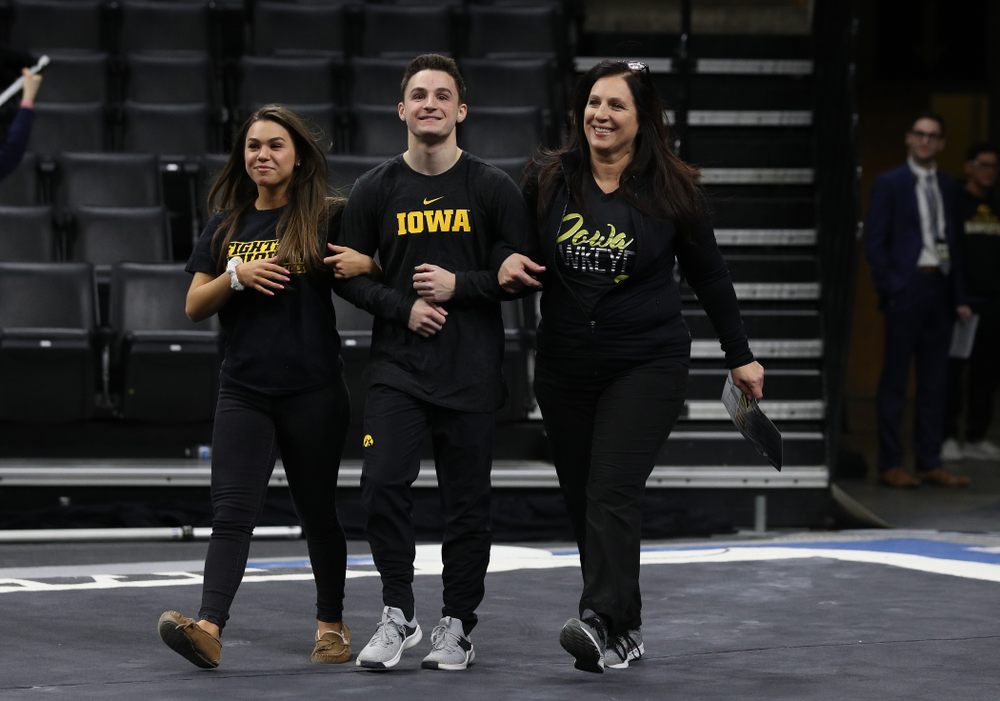 Iowa Men's Gymnast Jake Brodarzon and his family during senior day ceremonies following their meet against the Ohio State Buckeyes Saturday, March 16, 2019 at Carver-Hawkeye Arena. (Brian Ray/hawkeyesports.com)