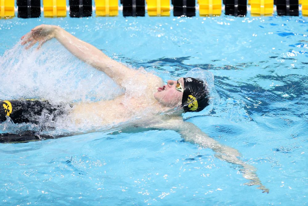 Iowa's John Colin competes in the 100-yard backstroke on the third day at the 2019 Big Ten Swimming and Diving Championships Thursday, February 28, 2019 at the Campus Wellness and Recreation Center. (Brian Ray/hawkeyesports.com)