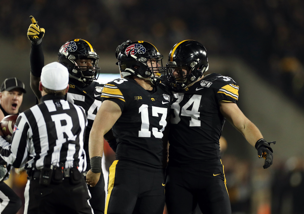 Iowa Hawkeyes linebacker Joe Evans (13) and linebacker Kristian Welch (34) against the Minnesota Golden Gophers Saturday, November 16, 2019 at Kinnick Stadium. (Brian Ray/hawkeyesports.com)