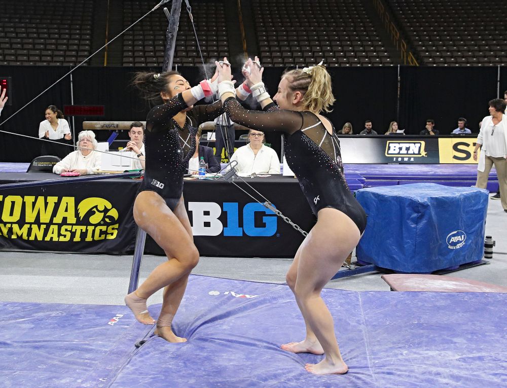Iowa’s Alex Greenwald competes on the bars during their meet at Carver-Hawkeye Arena in Iowa City on Sunday, March 8, 2020. (Stephen Mally/hawkeyesports.com)