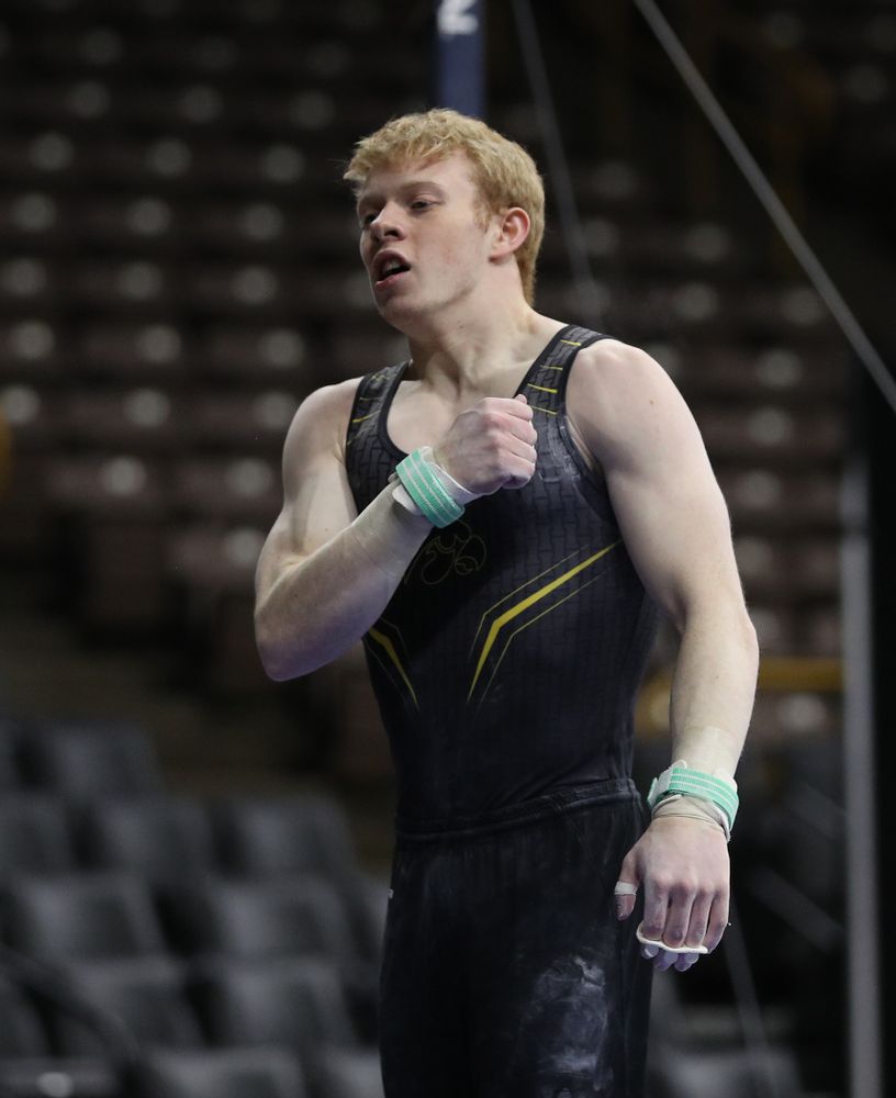 Iowa's Nick Merryman competes on the high bar against the Ohio State Buckeyes Saturday, March 16, 2019 at Carver-Hawkeye Arena. (Brian Ray/hawkeyesports.com)