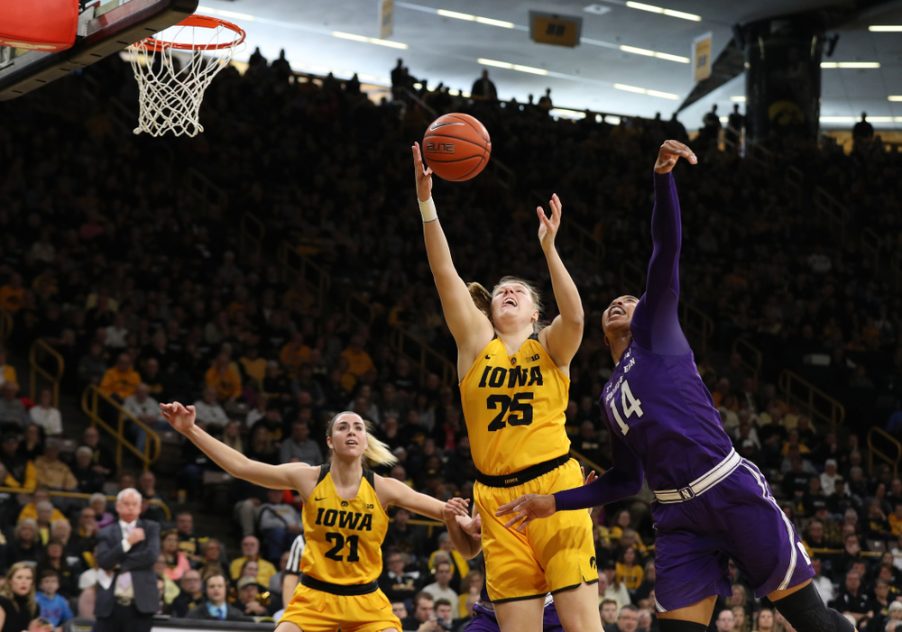 Iowa Hawkeyes center Monika Czinano (25) against the Northwestern Wildcats Sunday, March 3, 2019 at Carver-Hawkeye Arena. (Brian Ray/hawkeyesports.com)
