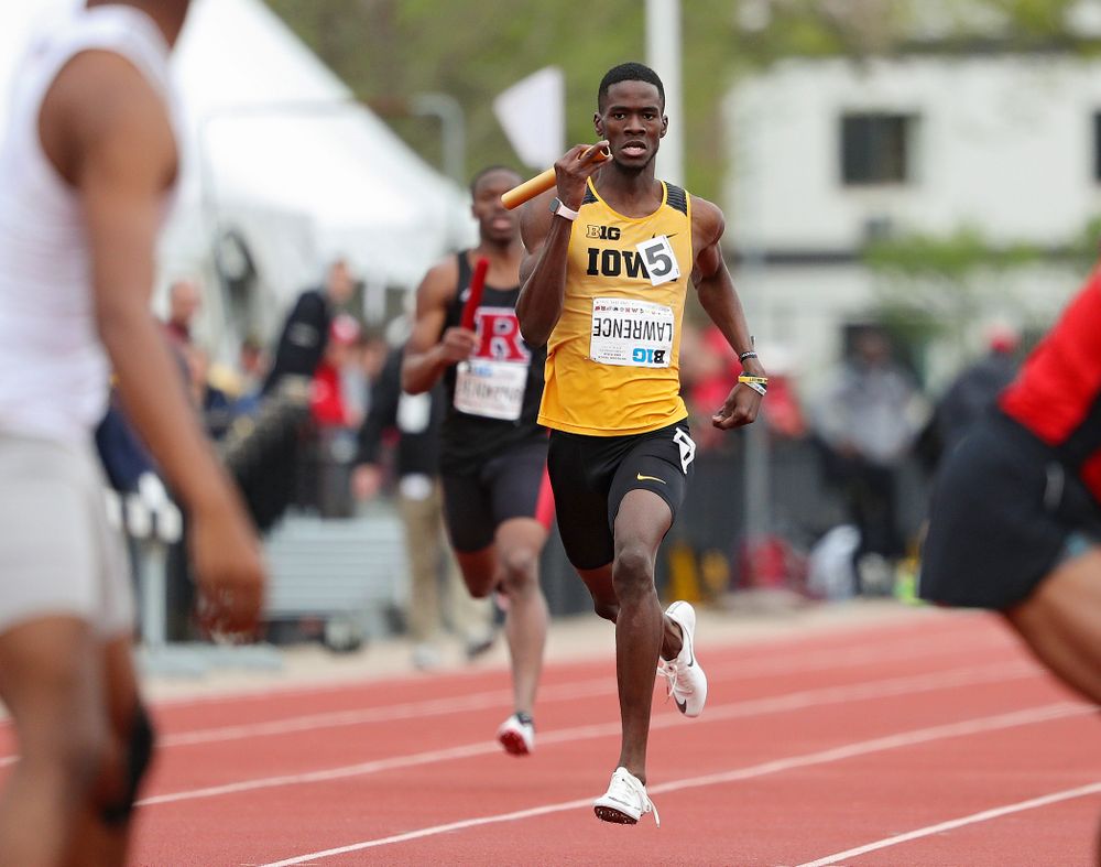 Iowa's Wayne Lawrence Jr. runs his section of the 1600 meter relay event on the third day of the Big Ten Outdoor Track and Field Championships at Francis X. Cretzmeyer Track in Iowa City on Sunday, May. 12, 2019. (Stephen Mally/hawkeyesports.com)